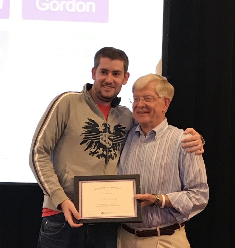 Erick receiving his NeuroPace trial completion certificate